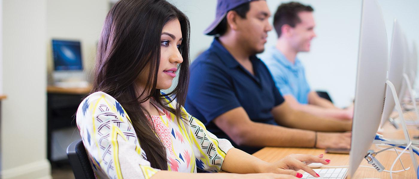 Close up of communication arts student in class